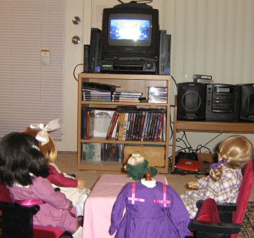 The girls watch the movie.