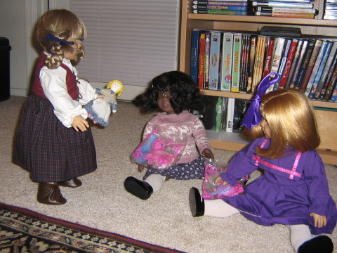 Kirsten holds Sari and confronts May and Nellie.