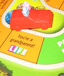 Red car lands on "You're a grandparent."