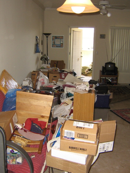 My apartment is a mess of boxes with no carpet.