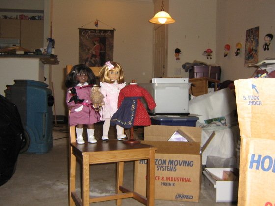 May, Mini Kit, Nellie, and Pegleg Sally pose on a chair in front of the carnage.